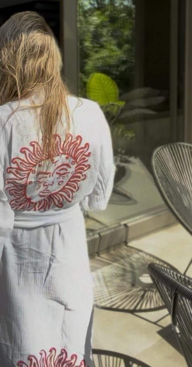 Lula Clothing sun-print gown — hand-printed sun motif on the back