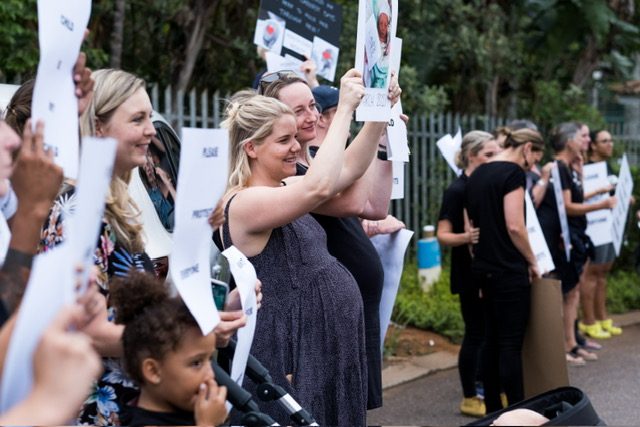 Mothers and children at the protest