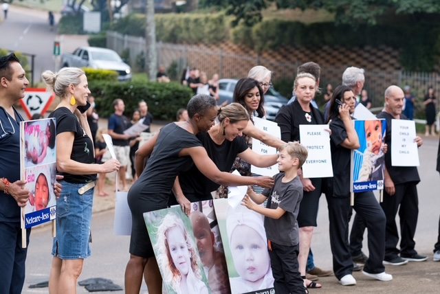 Healthcare practitioners at the protest