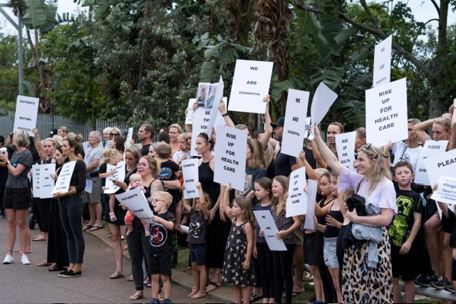 'Moms + kids lives matter' placard